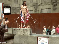 Juliette March is an embarrassment to the USA. This slutty loser tourist with her pathetic selfie stick is lost in Madrid! Mona Wales doesn't even want to be seen with her. Luckily no one is better at humiliating Juliette March more than herself. She gets fully nude in a crowded downtown area and drapes an American flag around herself. After shaming herself in front of everyone, she is hungry for Euro COCK! At a crowded bar this anal slut gets double filled and fucked hard in rope bondage. Everyone there gets a piece of this american pie!