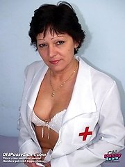 Mature head nurse Eva dildoing her hairy pussy at gyno office