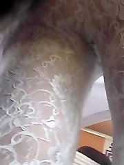 Upskirt of a lace pantyhose