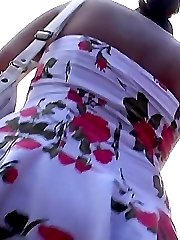 Dressed-up brunette upskirt