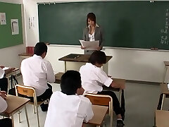 Teacher Yuuno Hoshi gets rampant at her class then fellates multiple cocks