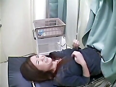 A new girl is probed on the gynecological table in this hot medical voyeur video