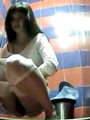 Naughty teens pissing straight onto voyeur camera