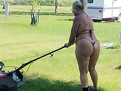 Got back to find wife mowing in a panty bikini, her ass and hips jiggling with every step 