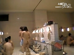 Asian woman with full jugs sitting at the voyeur cam dvd 03174