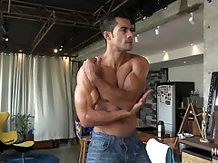 Muscle hunk sizzling posing