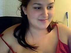 Chubby nymph sucks toy on webcam