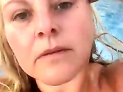 Kitty Queen - Just Nude Swimming - Towheaded BBW Cougar swimming in the pool