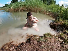 Unshaved Brown-haired Rubbing her Pussy with a Mud