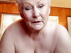 Nasty Grandma Showing Off Her Fat Pussy As She Fumbles It With A Dildo