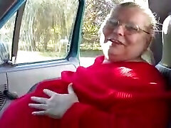 Filthy BBW grandma of my wife shows off her flabby juggs in car