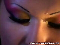 Pierced domina in spandex Pierced domina in spandex