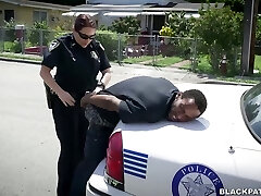 Horny officers of the law ravage black scofflaw in threesome Horny officers of the law ravage black scofflaw in threesome