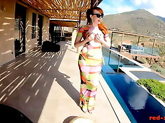 Redhead MILF Red XXX stroking outside by the pool