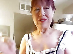 Grandmother in my sexy lace apron cooking shrimp & grits Grandmother in my sexy lace apron cooking shrimp & grits