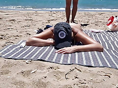 young girl gets porked on the beach by a stranger fucking from behind