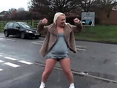 Chubby blond pissing outdoors
