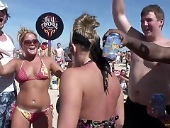 Charming babes in swimsuit casting their marvelous tits partying wildly at the beach in reality shoot