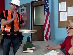Towheaded with glasses letting the bald geezer poke her in the classroom