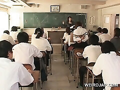 Chinese school babe in ropes displays twat upskirt in class