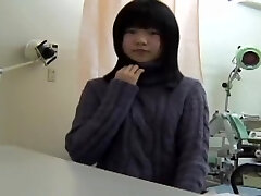 Young Japanese woman reaches an climax at her gyno.s office
