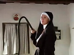 Gimp girl is tied up and whipped by a gorgeous nun