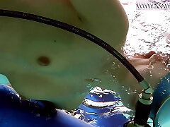 Hungarian beauty fucks fake penis underwater