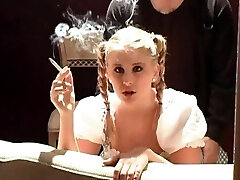 Ponytailed blonde gets hammered from behind while smoking a Ponytailed blonde gets hammered from behind while smoking a