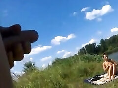 Dickflash - Draining for a topless sunbather .360p