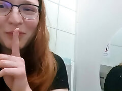 Cute Redhead Teen masturbates on public restroom