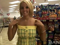 Cute blond haired chick flashes her pierced cunny in the shop