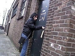 Deep-throating a cock through a glory hole after toying with her snatch Deep-throating a cock through a glory hole after toying with her snatch