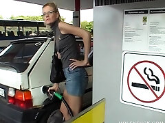 Slut at the gas station bathroom has gloryhole sex