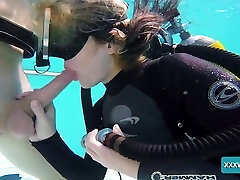 Really naughty scuba diver Monica is prepped to work on prick underwater