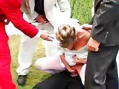 Bride gets fucked by groom’s friends and showered with jizm