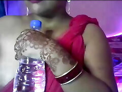 Hot desi super-sexy girl opens her clothes and shows her boobs and nipples.