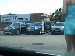 Filming mind-blowing skanky shemale on the parking lot in different clothes Filming mind-blowing skanky shemale on the parking lot in different clothes