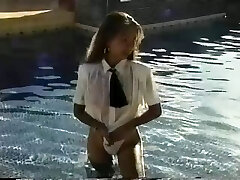 Outdoor solo scene where a fine looking cougar boasts on her cool hooters