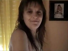Mature woman masturbates in front of webcam
