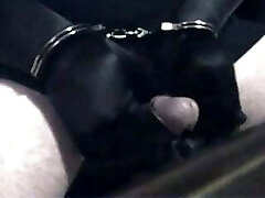 Gloved and handcuffed and self sheer pleasure ..
