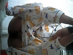 Chinese peeing in pajama