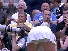 Sweaty tennis honey bending over after match