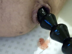 Anal beads big black full insertion