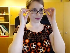 Hot nerdy girl disrobing and dancing nude on webcam