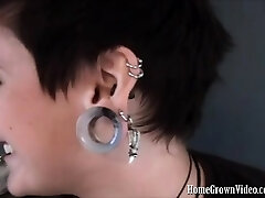 Heavily pierced and tattooed brunette Isabell is conversing