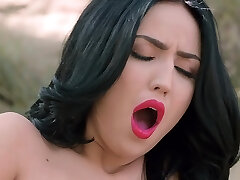 Black-haired model Jade Baker enjoys to play solo while in the outdoors