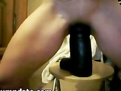 Kinky babe inserts big toy in her vag