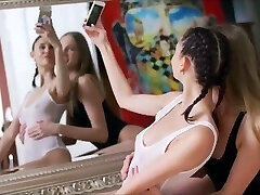 2 girl ravage front of mirror
