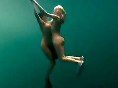 Busty nude swimmers make erotic underwater art
