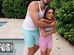 Petite girl and huge man playing super-naughty by the pool